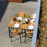 Kirra Dining Table & 4 Kirra Patio Chair i svart – miljöbild