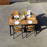 Kirra Dining Table & 4 Kirra Patio Chair i svart – miljöbild