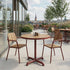 Kirra Cafe Table & 2 Kirra Patio Chair i Chestnut – miljöbild